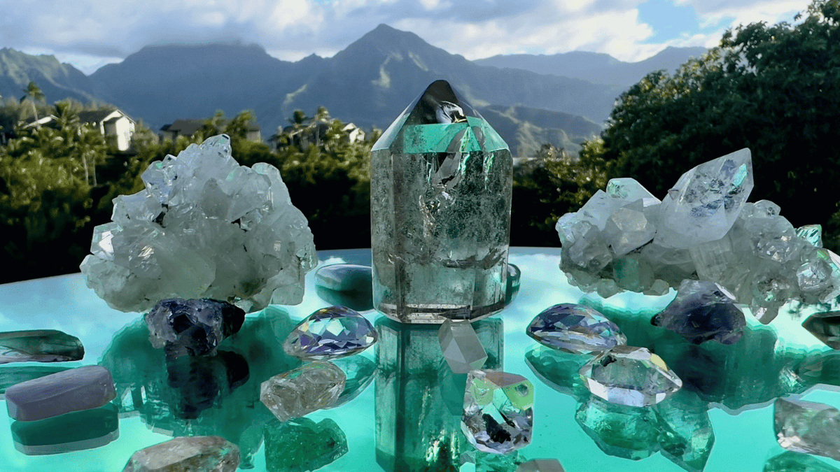 Crystal Gridwork on a table with Kauai landscape in the background. World Class crystal collection Sparkle Style® Kauai, HI 