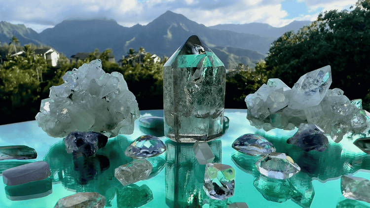 Crystal Gridwork on a table with Kauai landscape in the background. World Class crystal collection Sparkle Style® Kauai, HI 