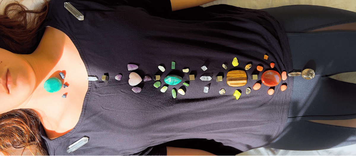 Immersive gem experience with Sparkle Style Co. Carefully selected gems and minerals are placed on the body.